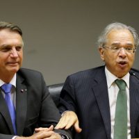 O presidente da República, Jair Bolsonaro e o ministro da economia, Paulo Guedes,fazem  declaração conjunta à imprensa no auditório do ministério da economia em Brasília