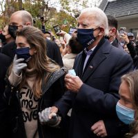 U.S. Democratic presidential nominee Joe Biden makes his way through the crowd outside of his childhood home on Election Day in Scranton, Pennsylvania, U.S. November 3, 2020. REUTERS/Kevin Lamarque