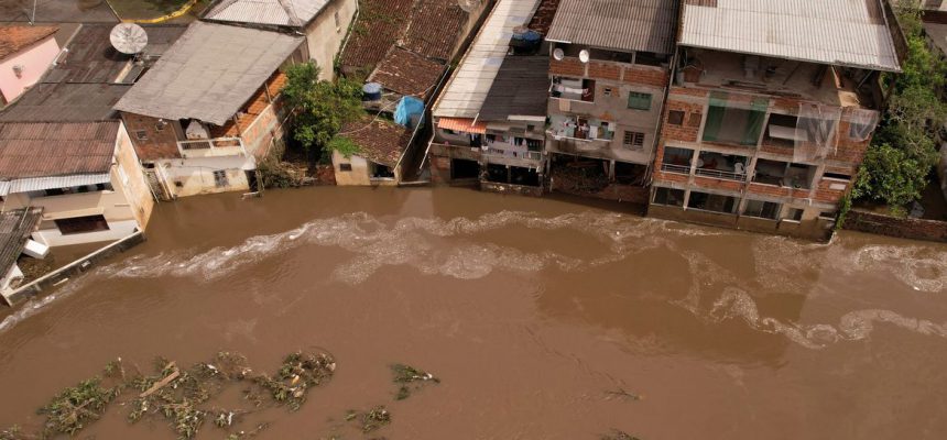 An aerial view shows a flooded street, caused due to heavy rains, in Itajuipe, Bahia state, Brazil December 27, 2021. Picture taken with a drone. REUTERS/Amanda Perobelli